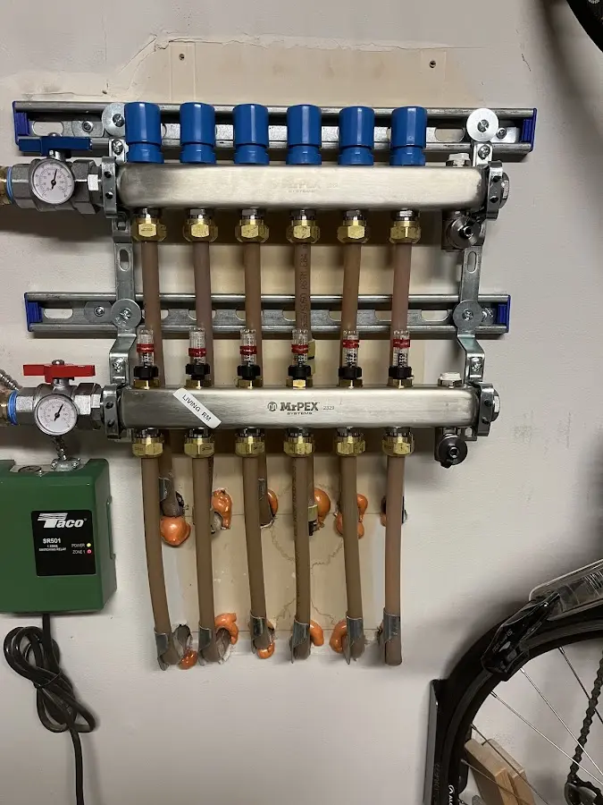 Plumber performing Water Heater Repair at a residential property in Central Park